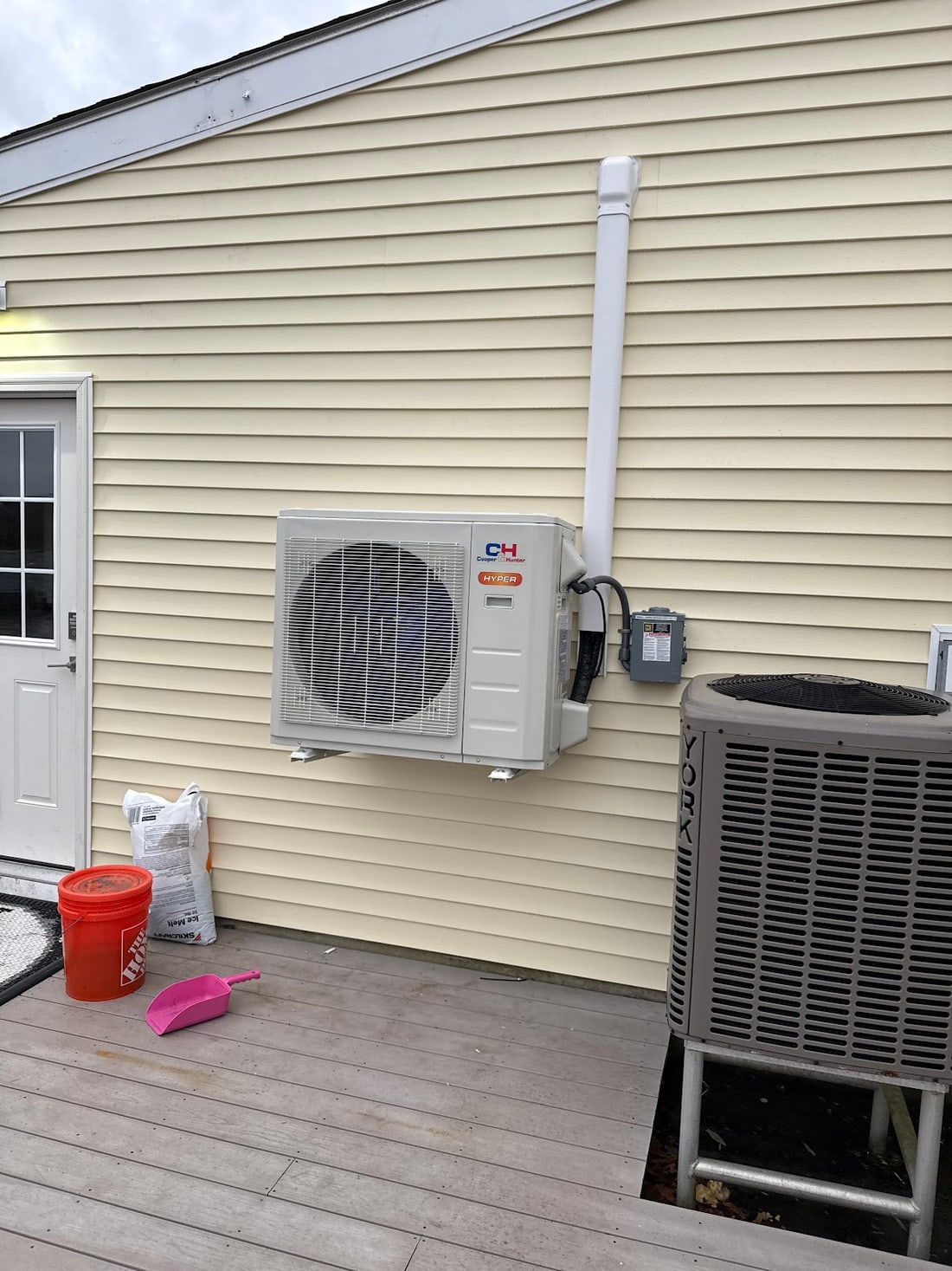 Cooper and Hunter Hyper heat pump and a York central air condenser installed at a South Shore home by Harbormen Heating and Cooling